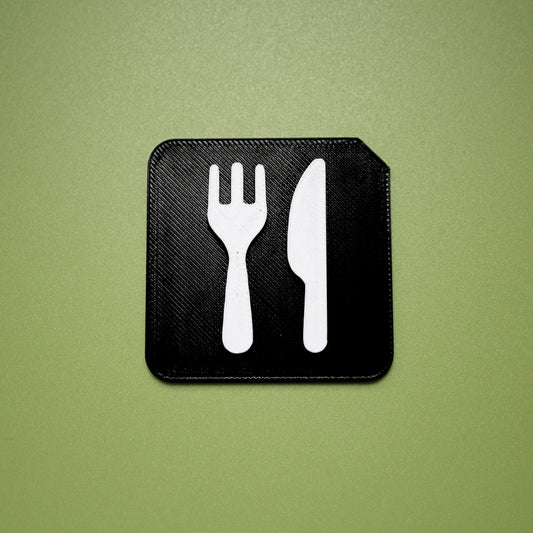 Eat tactile tile showing raised symbol for SEND and AAC mealtime communication support