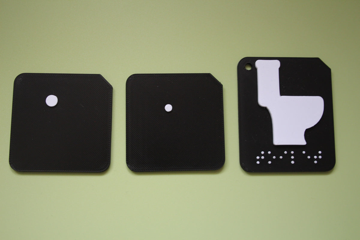 Comparison of large pre-braille small pre-braille and standard braille tactile tiles showing the three font options for VI learners