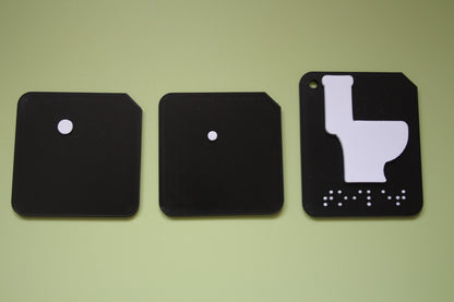 Comparison of large pre-braille small pre-braille and standard braille tactile tiles showing the three font options for VI learners