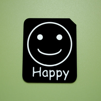 Happy tactile tile - 3D printed raised symbol showing happy face for AAC and SEND communication with vocabulary