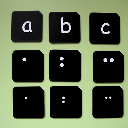 Size comparison of pre-braille alphabet tactile tiles showing different sizes available for VI and SEND learners