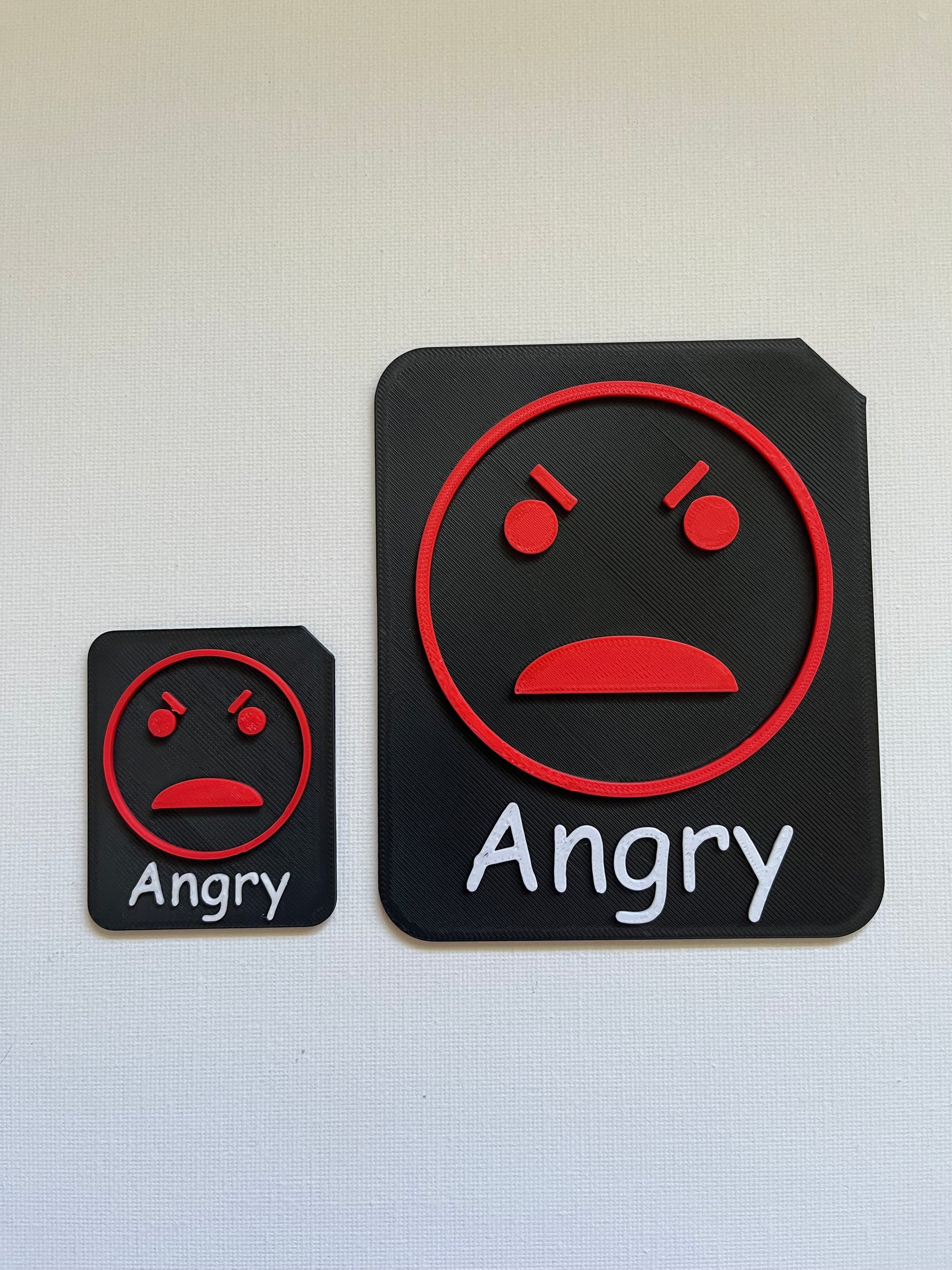 9cm tactile emotion tile showing worried face for SEND regulation support