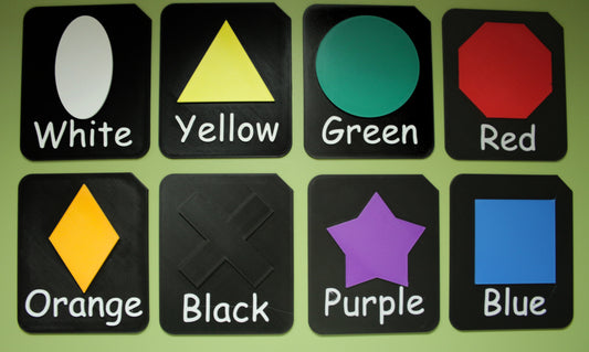 Shape and Colour Learning Tiles set showing 8 tactile tiles in different colours and shapes for SEND CVI and VI learners