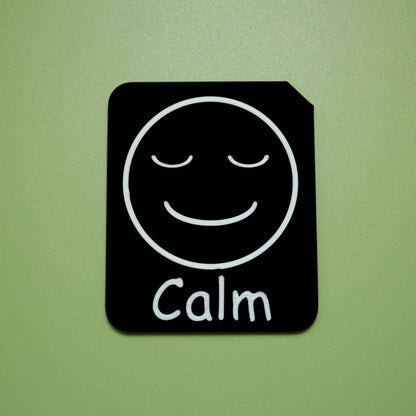 Calm tactile tile - 3D printed raised symbol showing excited face for AAC and SEND communication with vocabulary
