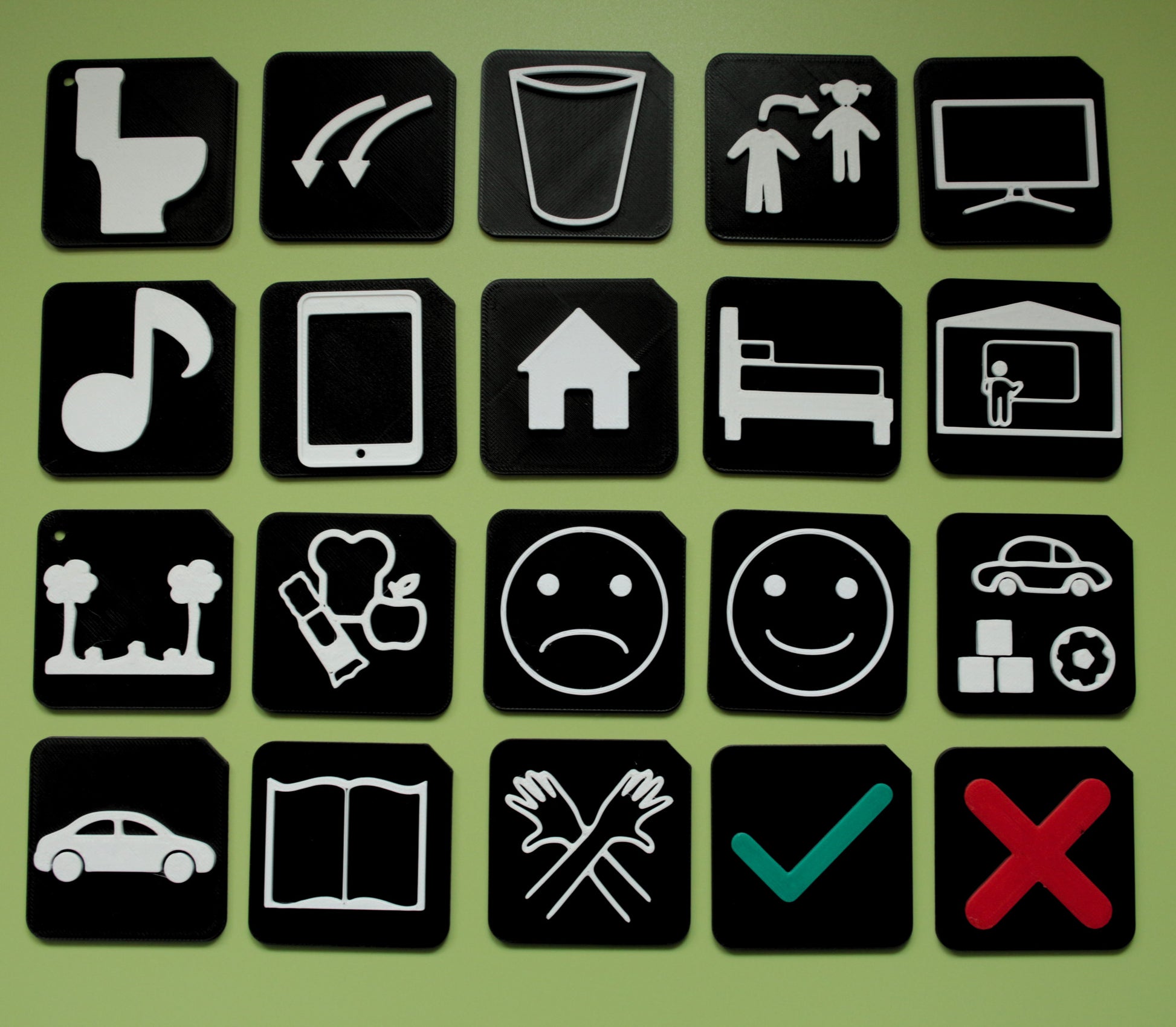 Tactile tiles included in the Parent Starter Pack showing raised communication symbols for SEND autism and VI learners