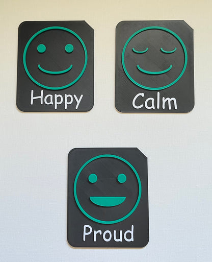 Large tactile tile showing sad face symbol for VI and AAC feelings communication