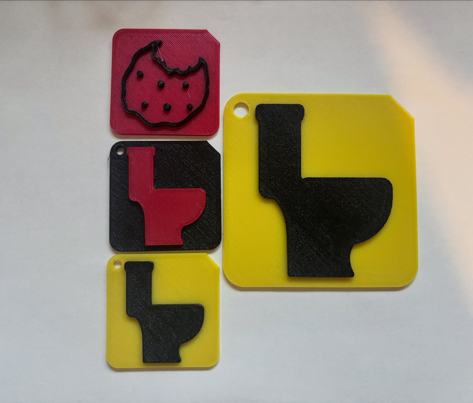 Tactile tiles custom set laid flat showing raised symbol and braille detail