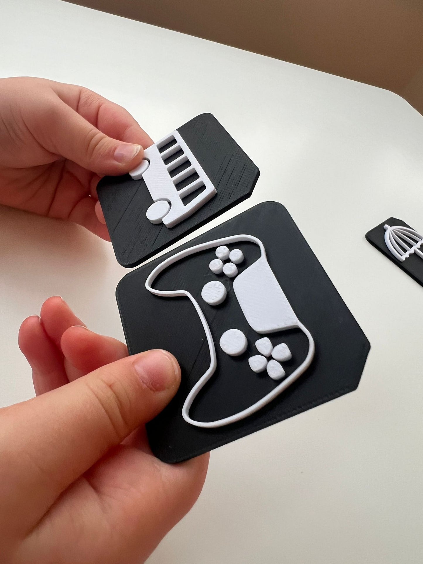 Tactile tiles in large format showing vocabulary and symbol options