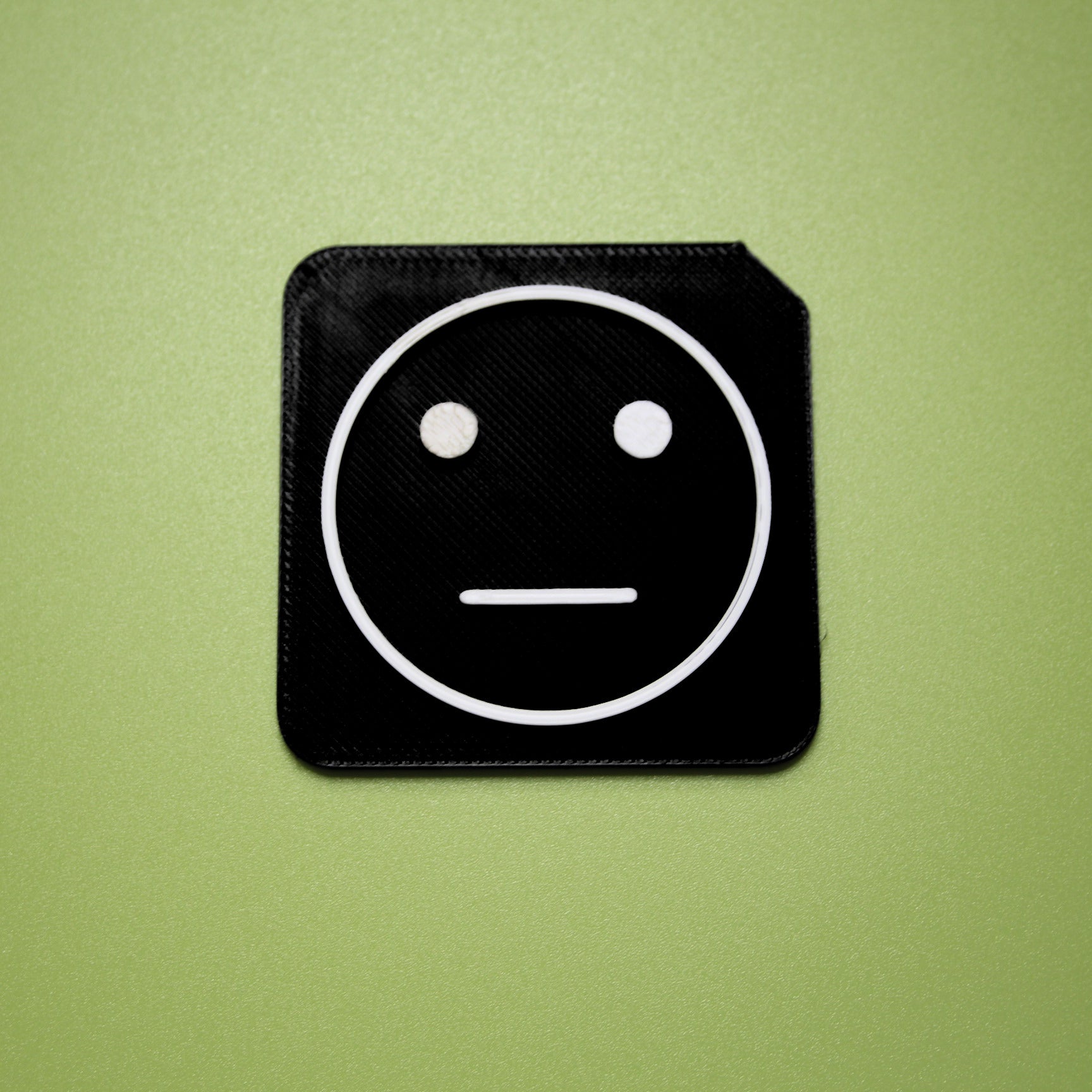 Bored tactile tile - 3D printed raised symbol showing bored face for AAC and SEND communication