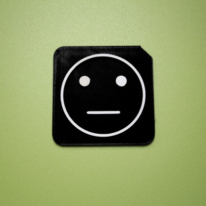Bored tactile tile - 3D printed raised symbol showing bored face for AAC and SEND communication