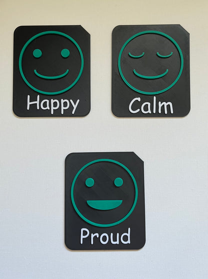 Large tactile tile showing surprised face for emotions communication support