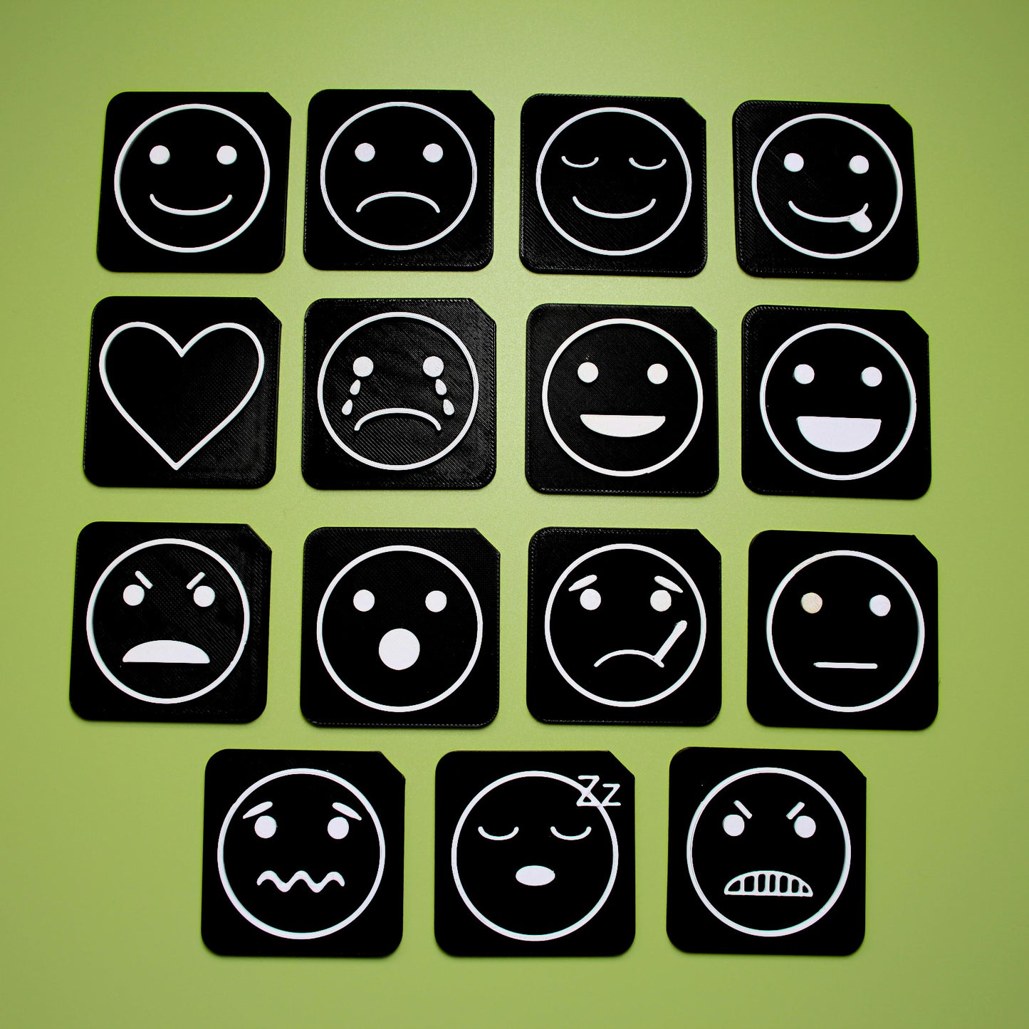 Full Feelings Communication Set showing 15 3D printed tactile emotion tiles for SEND AAC and VI learners