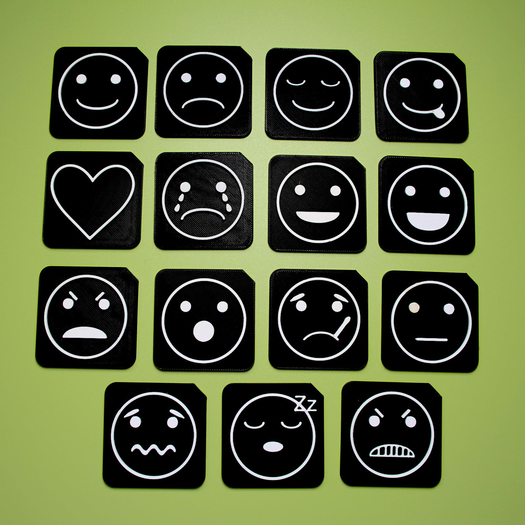 Full Feelings Communication Set showing 15 3D printed tactile emotion tiles for SEND AAC and VI learners
