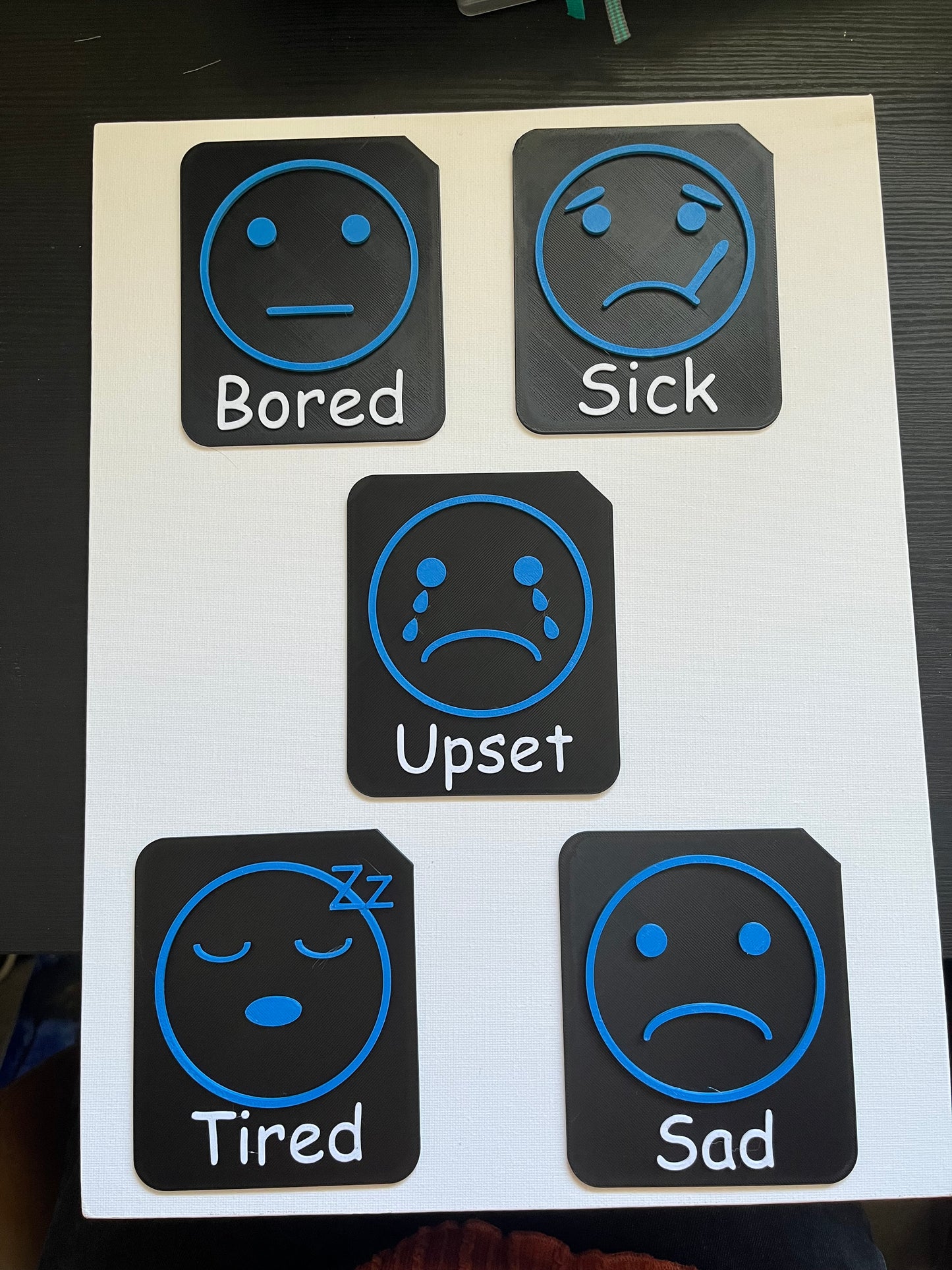 Collection of large 9cm emotion tiles showing range of feelings symbols for SEND learners