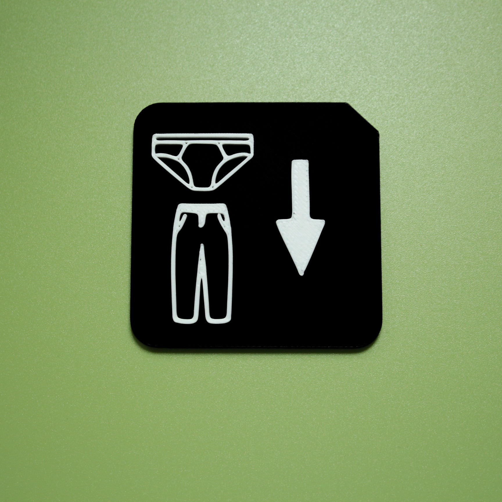 Pants down tactile tile for SEND and autism toilet training routine support