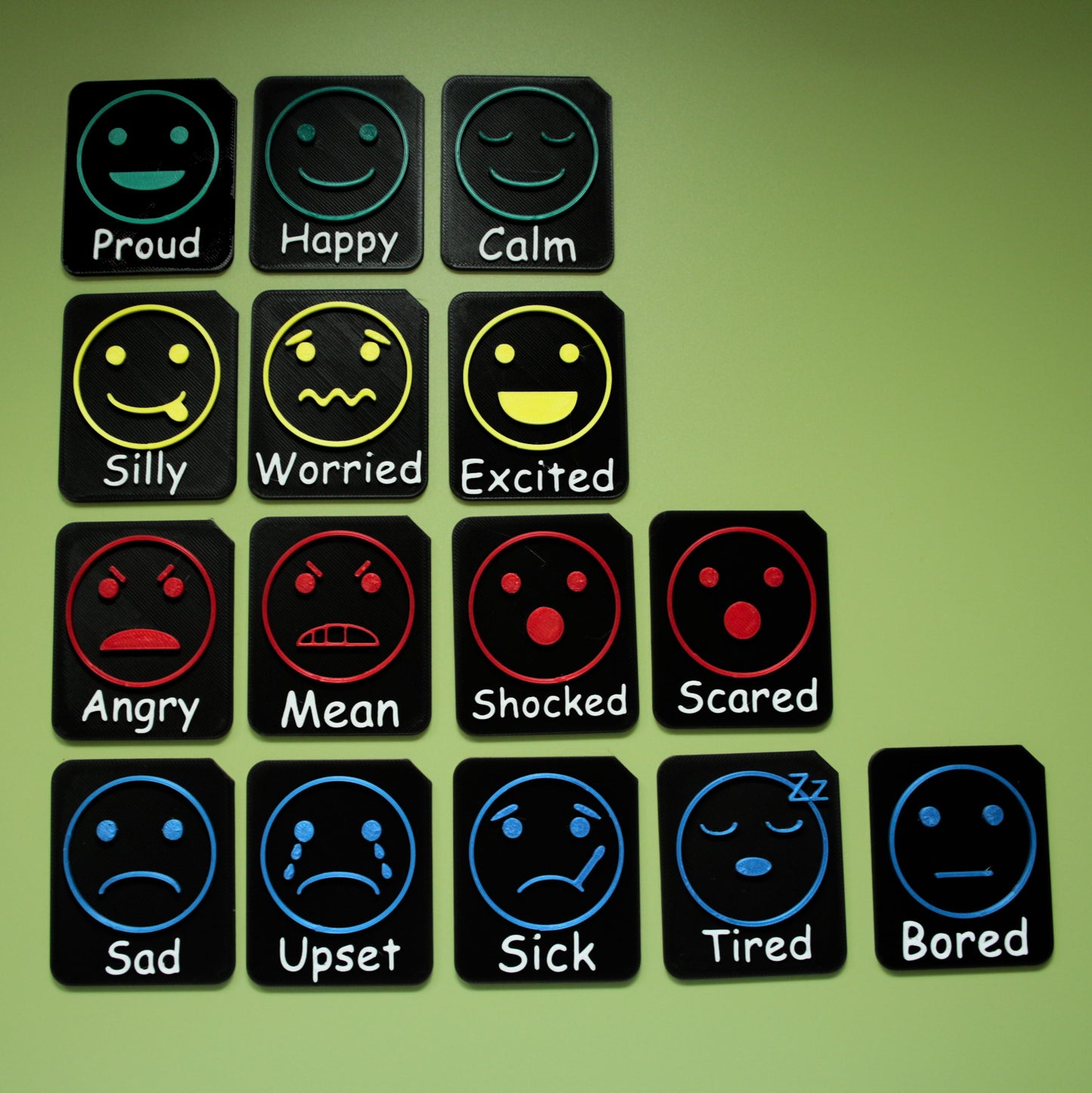 Zones of Regulation colour coded Feelings Set showing 15 multicoloured 3D printed tactile emotion tiles