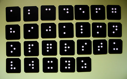 Full pre-braille alphabet tactile tile set showing all 26 lowercase letter tiles for VI and SEND learners