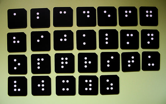 Full pre-braille alphabet tactile tile set showing all 26 lowercase letter tiles for VI and SEND learners