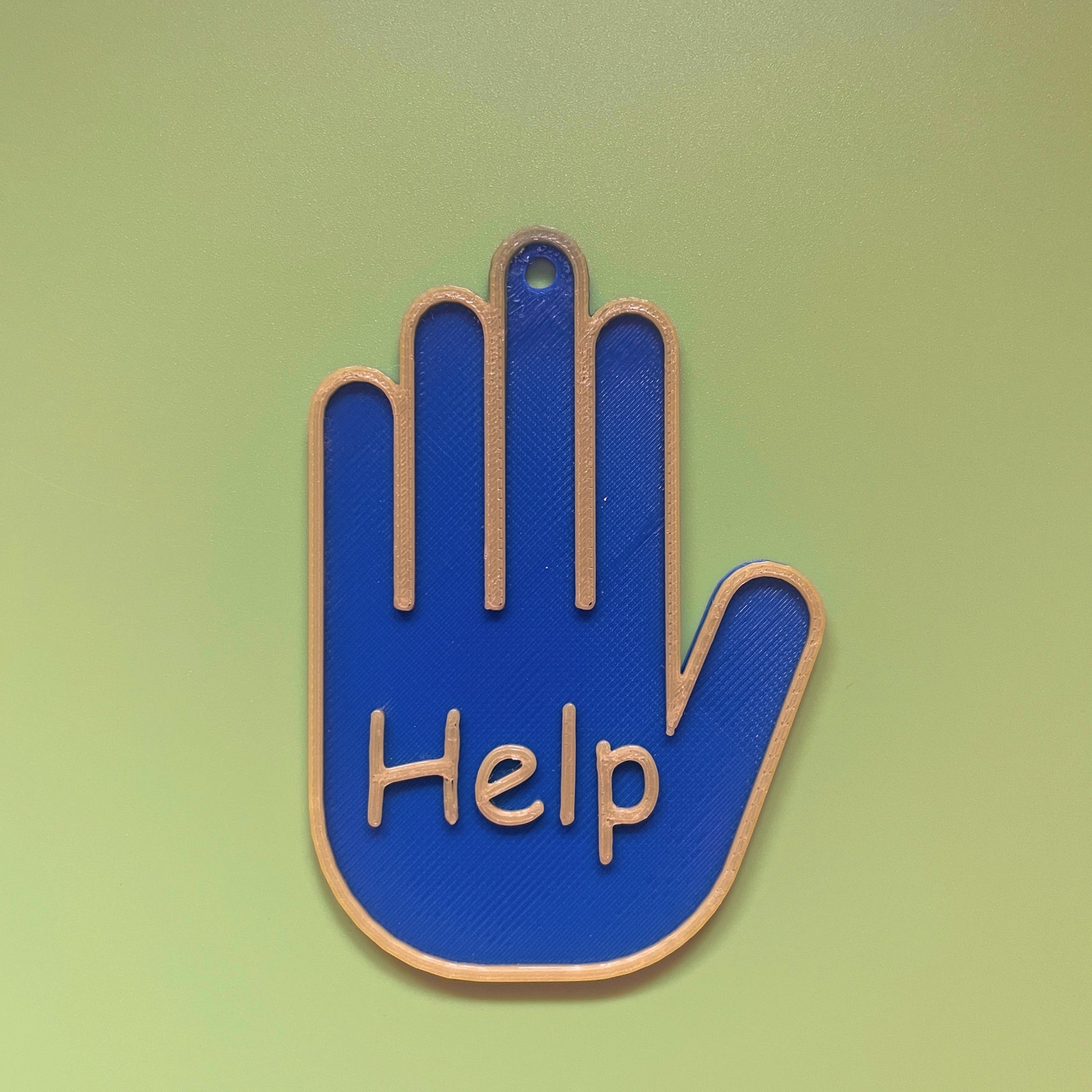 Close-up of ASD Lanyard Support Set symbols showing raised tactile detail for VI and SEND learners