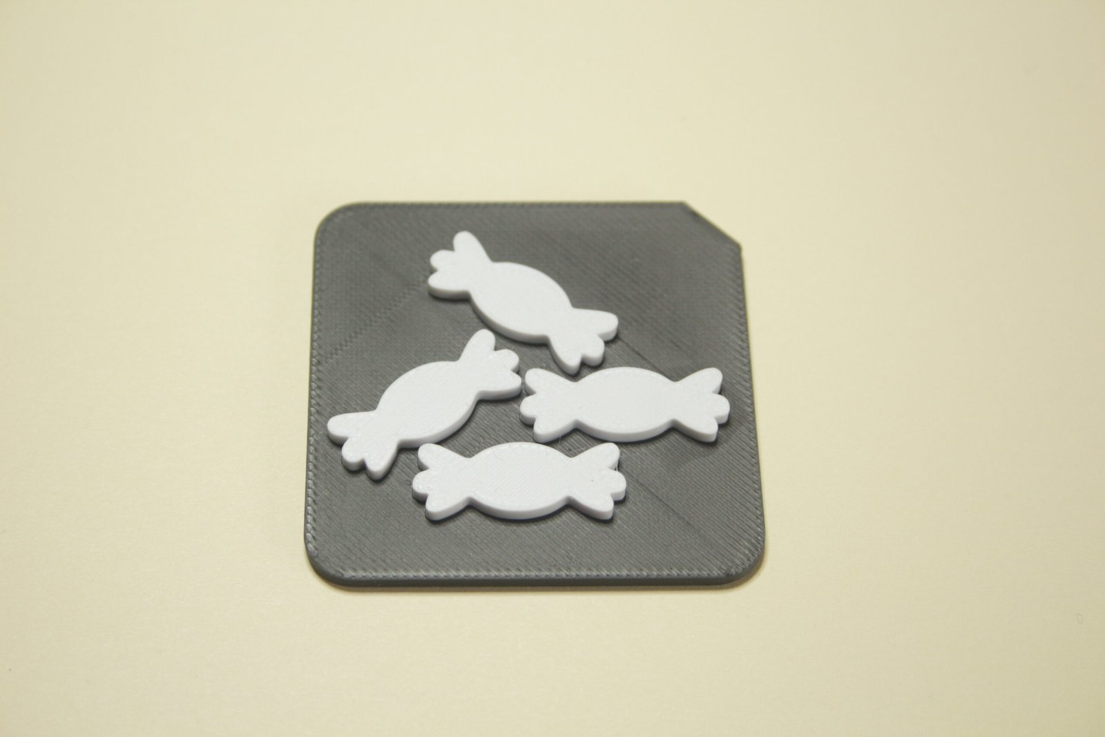 3d printed Tactile Tile showing sweets symbol