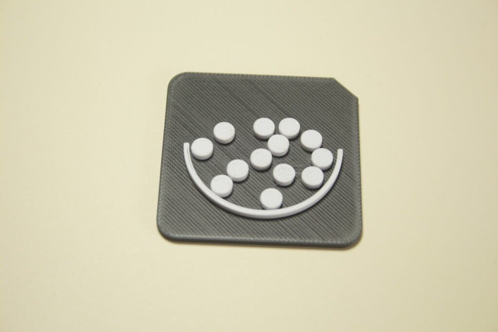 Tactile AAC tile showing 'Full' vocabulary symbol