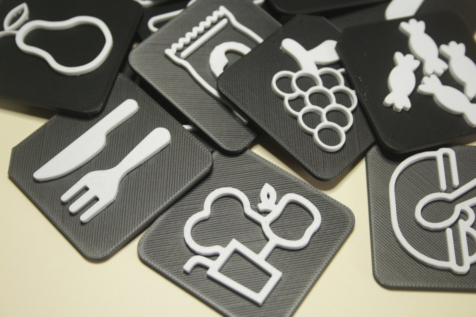 TacTiles showing food symbols including grapes, sweets, and cutlery