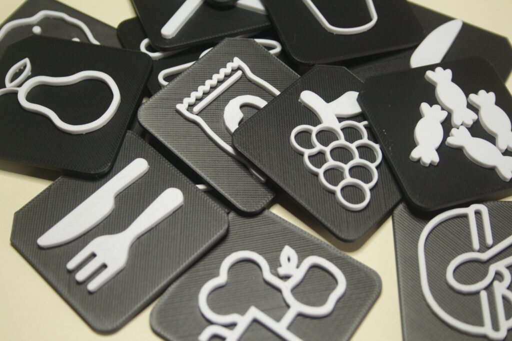 Food category tactile tiles designed for choice making and AAC