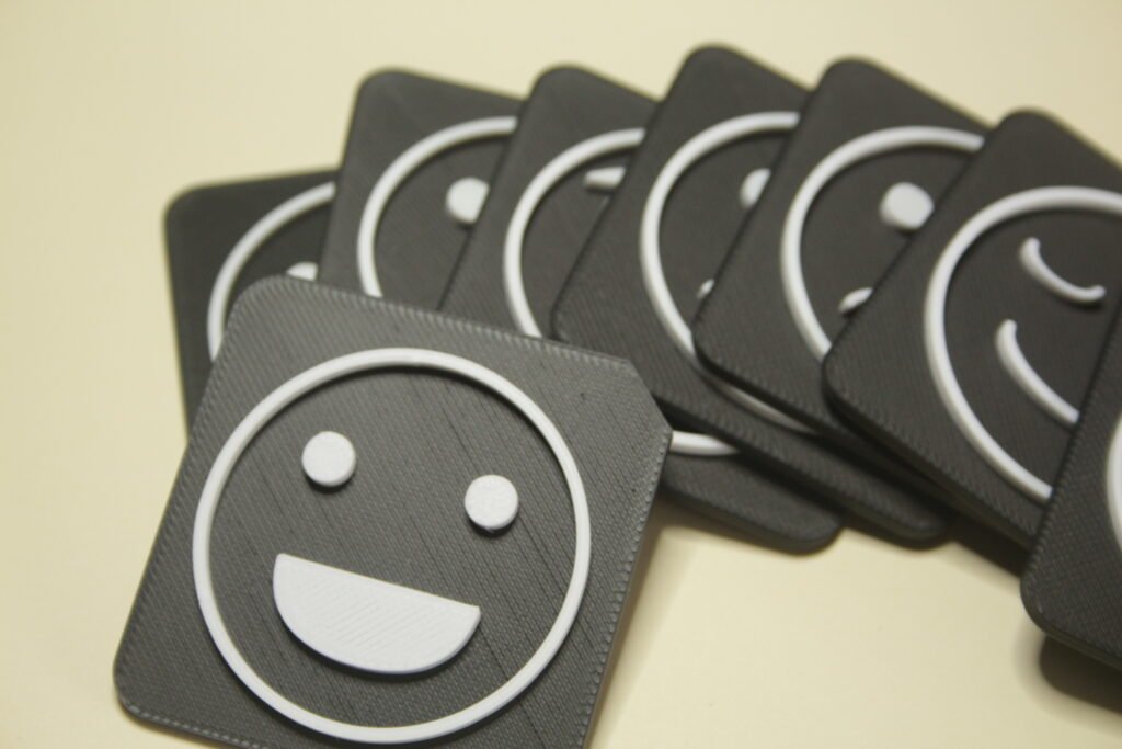 Tactile communication tiles showing emotion symbols for SEND learners
