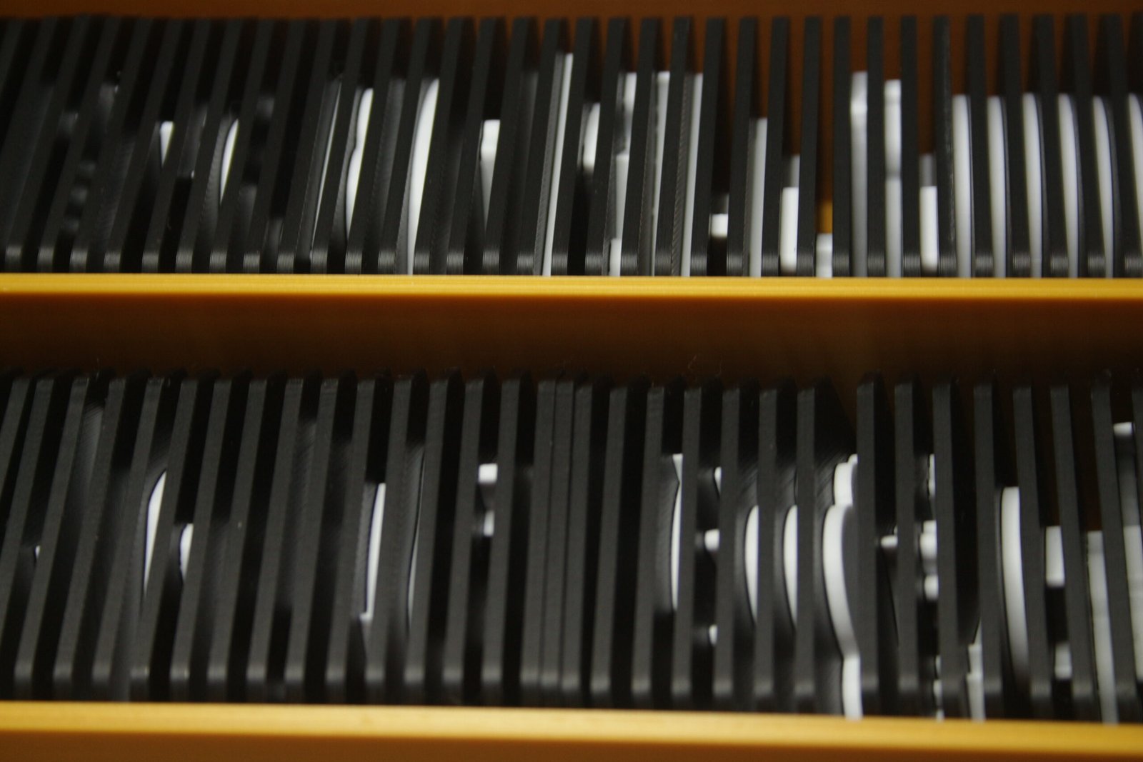 Box of tactile tiles stored and organised by set